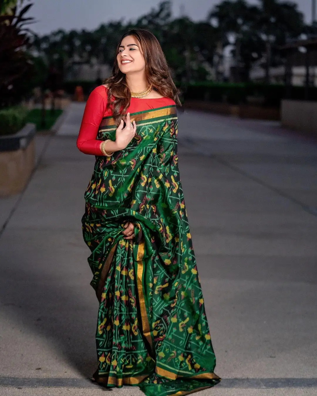 Priyanka Sharma Stills In Green Saree Red Blouse